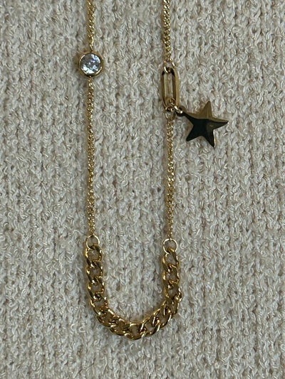 Small star and diamante gold necklace