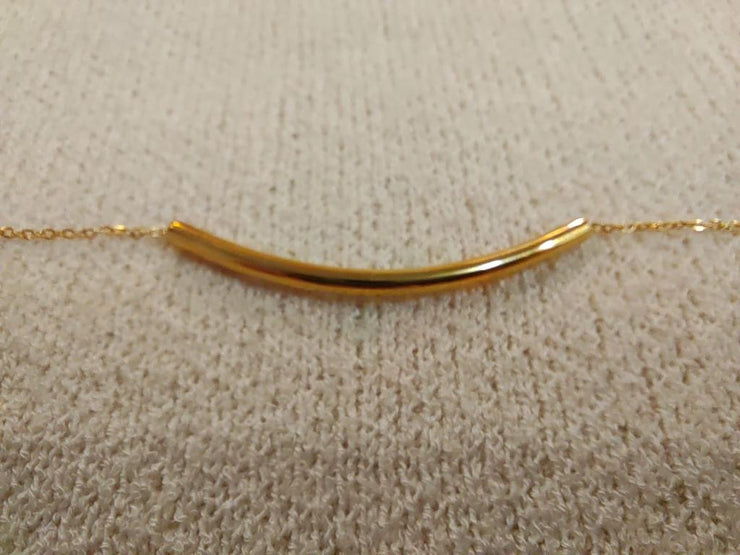 Gold tube bracelet